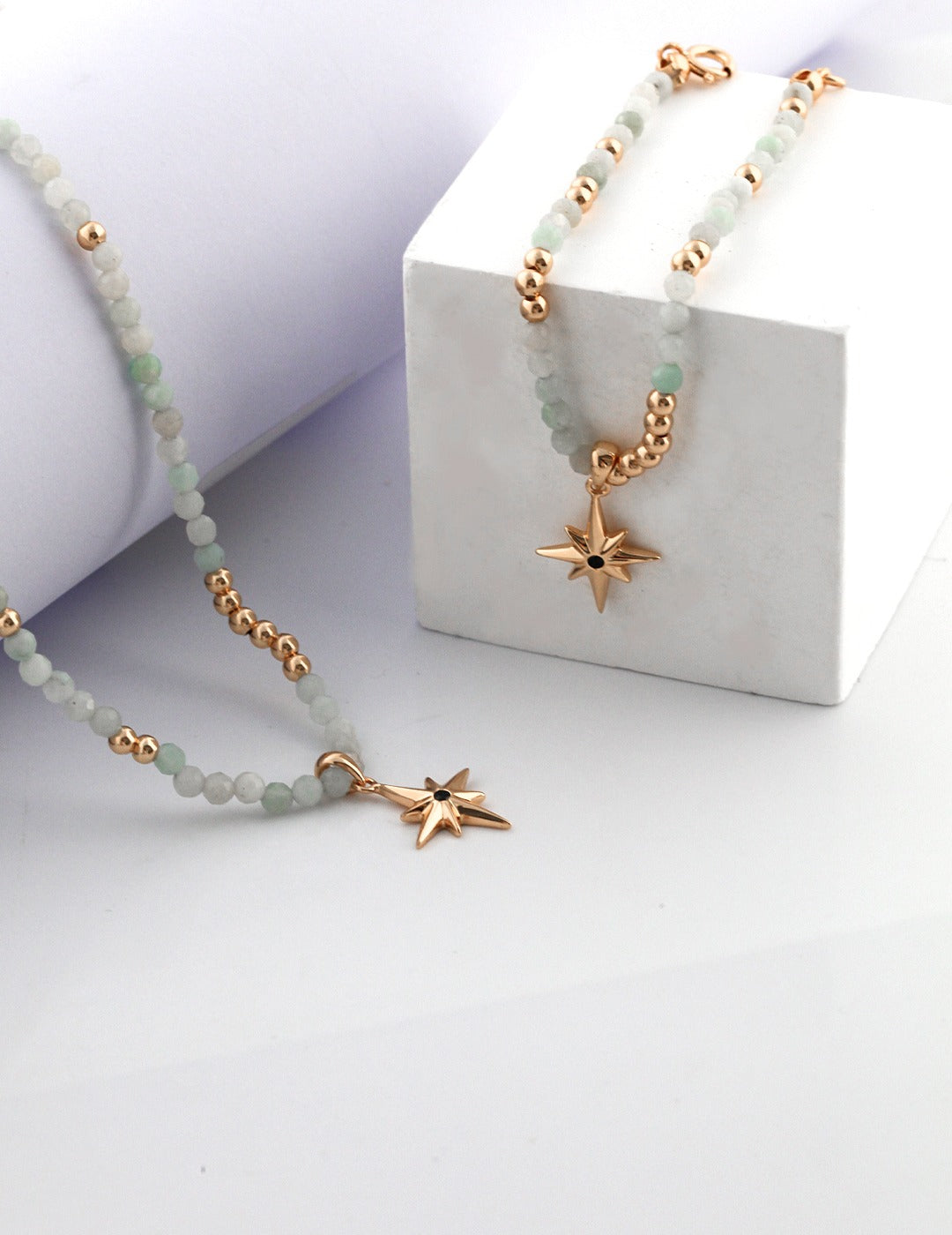 North Star Necklace with Burmese jade beads, featuring a vintage gold North Star pendant and adjustable chain, combining celestial charm with natural elegance.